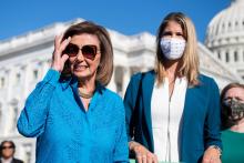 House Speaker Nancy Pelosi, D-Calif., conducts a news conference on the abortion rights bill outside of the Capitol on Friday. Reps. Lori Trahan, D-Mass., and Lizzie Fletcher, D-Texas, right, also appear. (Tom Williams/CQ Roll Call)